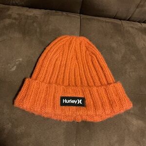 Hurley brand. One size fit all. Burnt orange color.